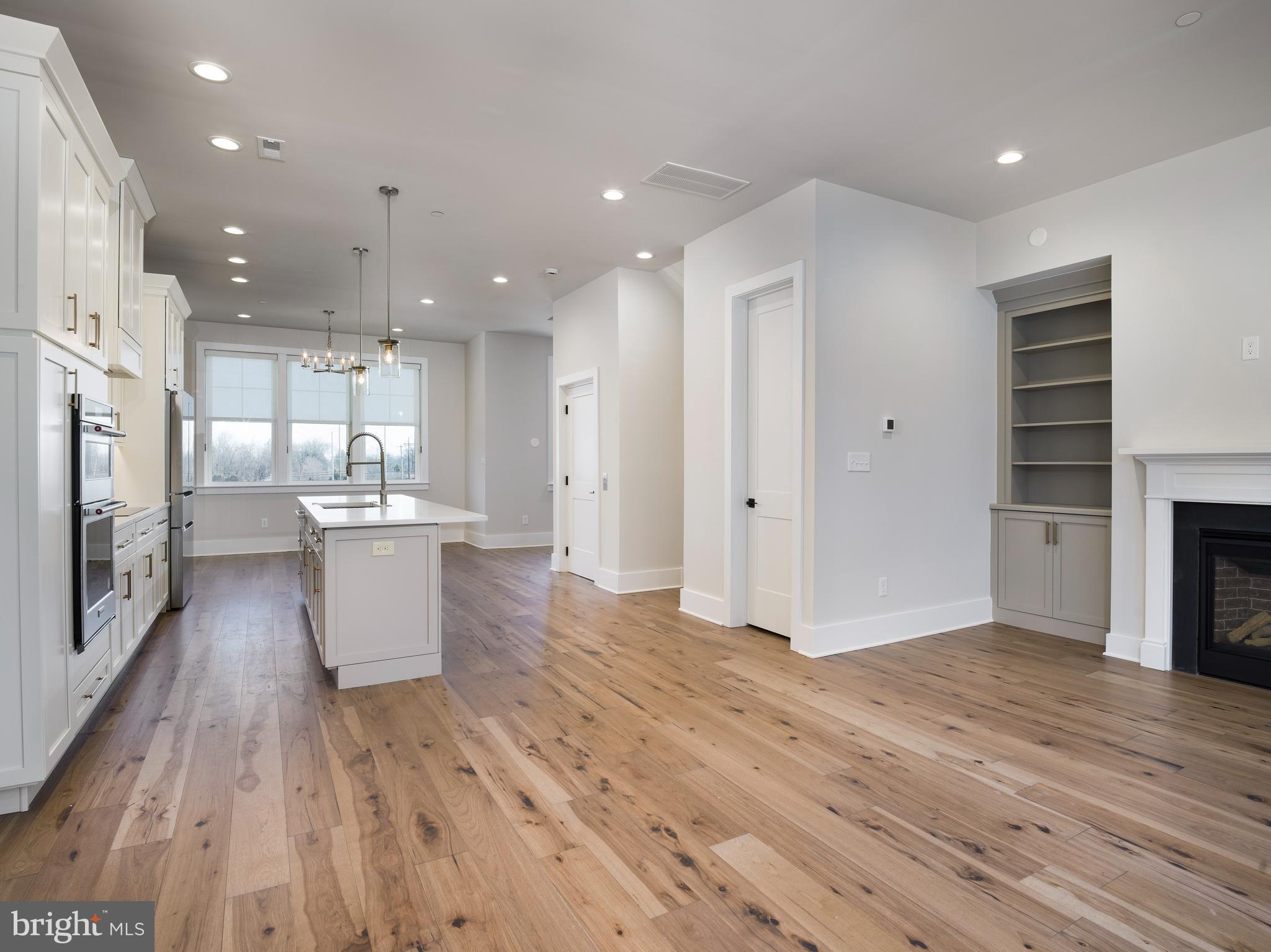354 Paddock Circle Newtown Square, PA 19073 - Photo 9 of 36 a large kitchen with a lot of counter space and stainless steel appliances