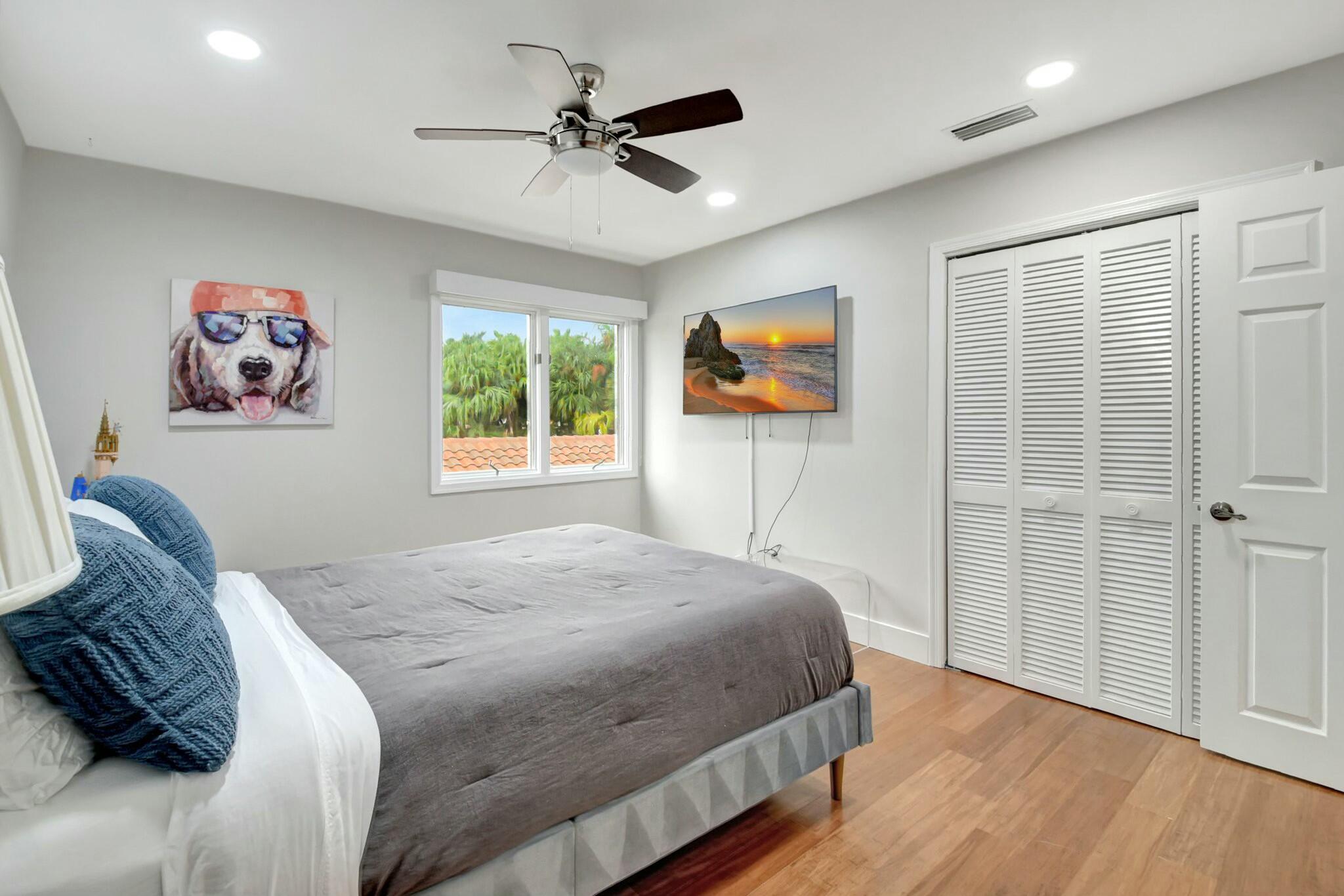 7860 Seville Place, Unit 2202 Boca Raton, FL 33433 - Photo 22 of 30 a bedroom with a bed and a window