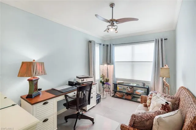 a livingroom with furniture and a window