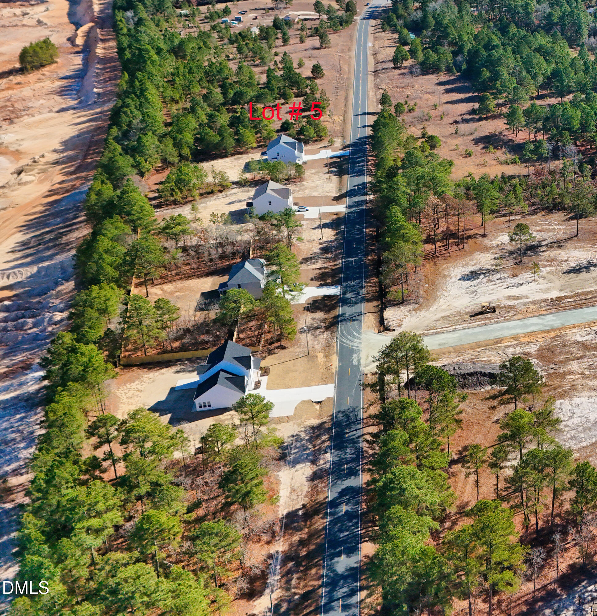 168 Dove Road Cameron, NC 28326 - Photo 3 of 5 an aerial view of residential houses with outdoor space