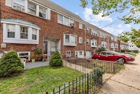 25 Exeter Road Jersey City, NJ 07305 - Photo 1 of 1 a front view of a building with small garden