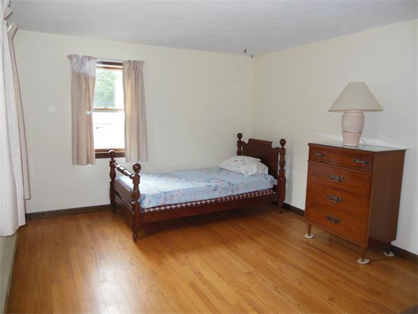 304 Edgewood Road West Springfield, MA 01089 - Photo 17 of 26 a bedroom with a bed and a window