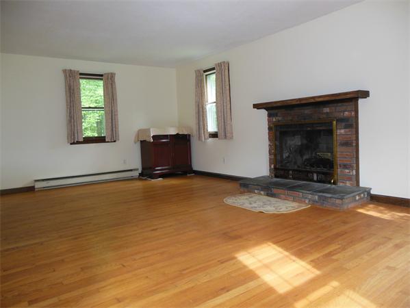 304 Edgewood Road West Springfield, MA 01089 - Photo 4 of 26 a view of empty room with a fireplace