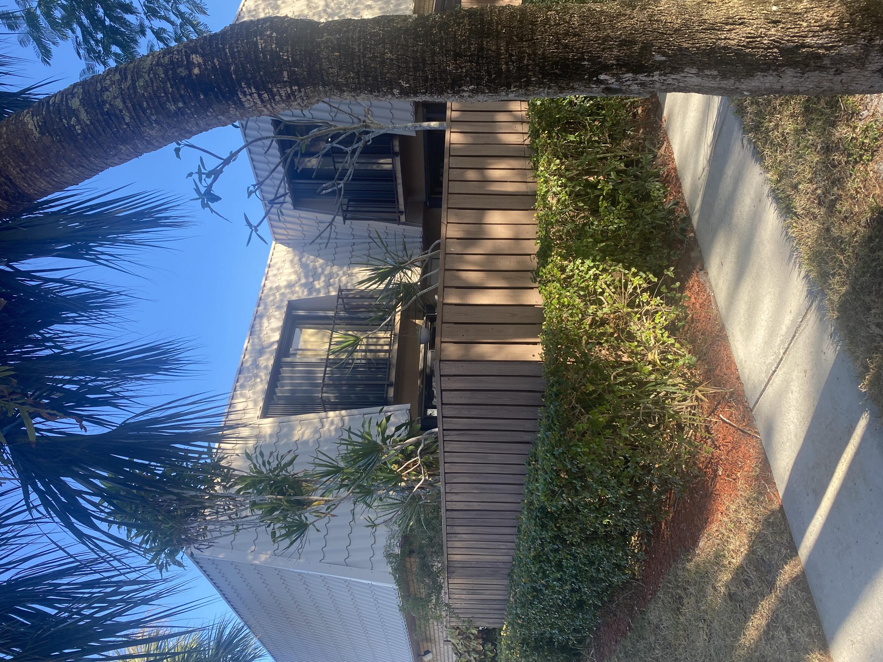 5808 58th Way West Palm Beach, FL 33409 - Photo 1 of 23 a view of a backyard