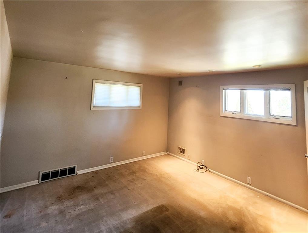 2417 Marbury Road Pittsburgh, PA 15221 - Photo 11 of 31 an empty room with windows
