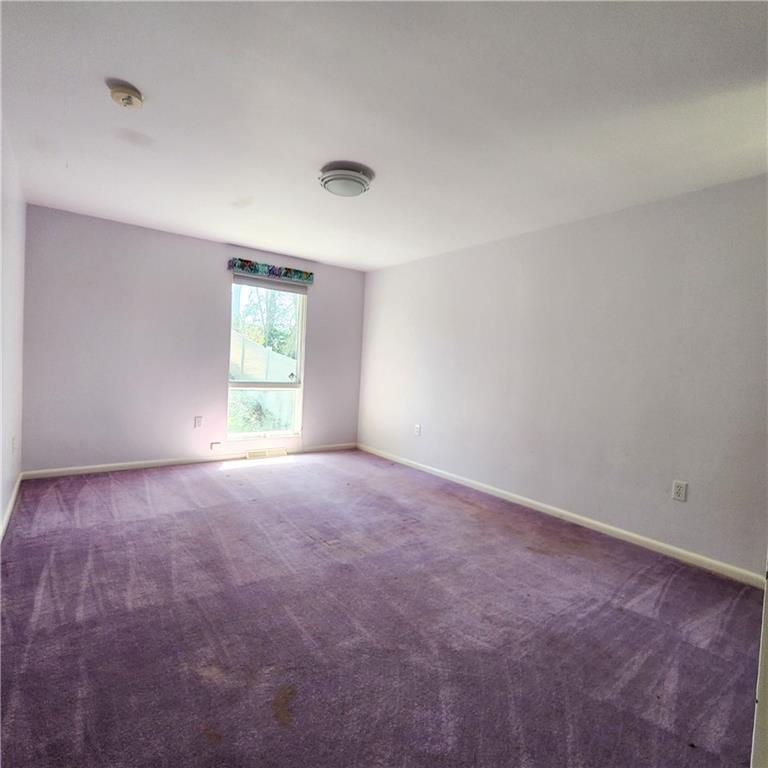 2417 Marbury Road Pittsburgh, PA 15221 - Photo 17 of 31 an empty room with windows