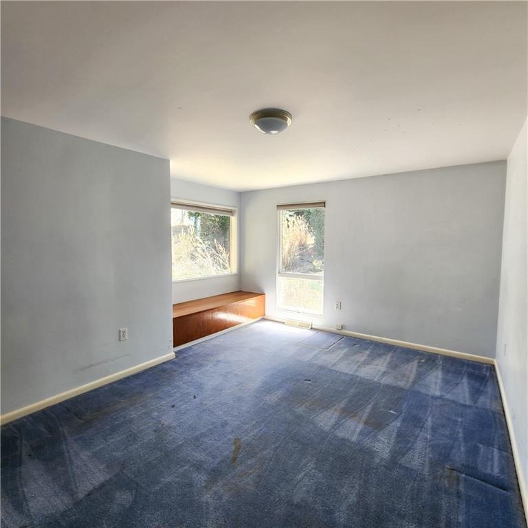 2417 Marbury Road Pittsburgh, PA 15221 - Photo 19 of 31 an empty room with windows
