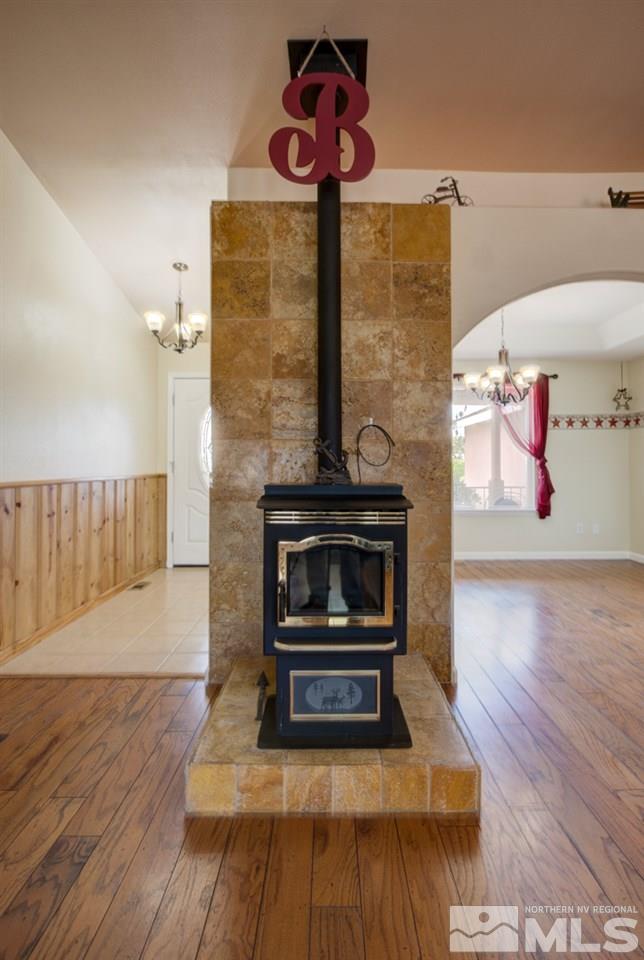 4413 Rancheria Road Fallon, NV 89406 - Photo 8 of 23 a living room with furniture and a fireplace