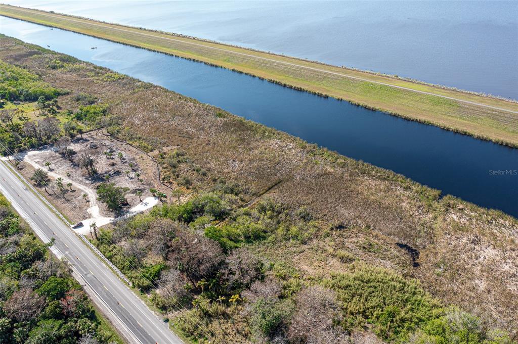 15460 Southwest Conners Highway Okeechobee, FL 34974 - Photo 24 of 28 a view of balcony with wooden floor