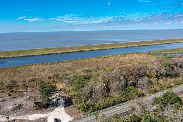 a view of a lake with a nearby beach
