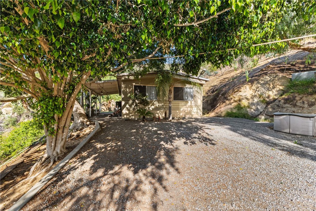 38942 Jubilee Way Fallbrook, CA 92028 - Photo 21 of 55 a front view of a house with a yard