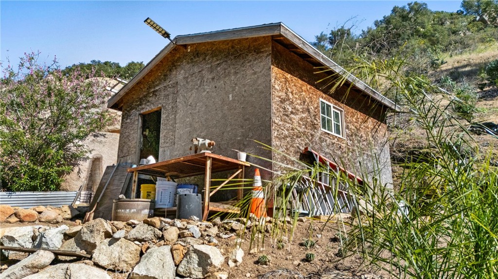 38942 Jubilee Way Fallbrook, CA 92028 - Photo 32 of 55 a front view of a house with a yard
