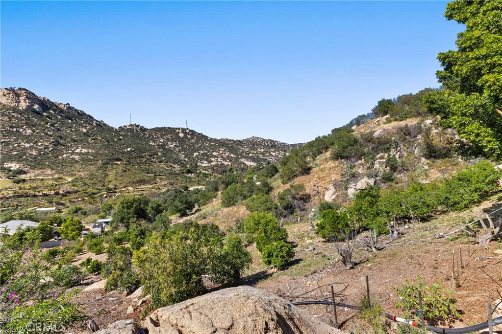 38942 Jubilee Way Fallbrook, CA 92028 - Photo 38 of 55 a view of a mountain range with trees in the background