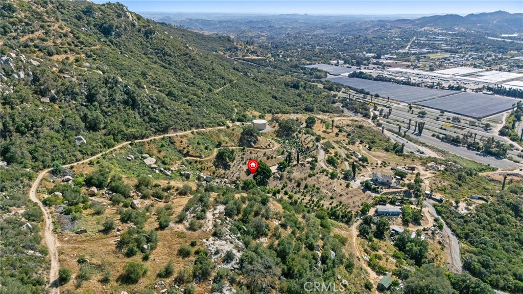 38942 Jubilee Way Fallbrook, CA 92028 - Photo 45 of 55 an aerial view of house with yard and mountain view