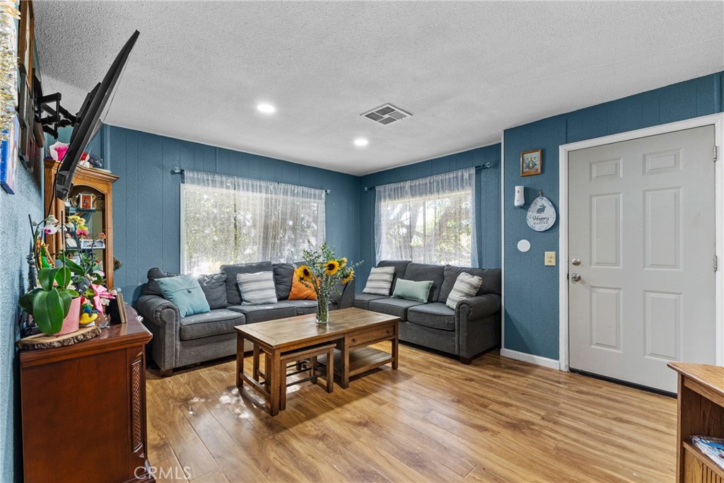 38942 Jubilee Way Fallbrook, CA 92028 - Photo 9 of 55 a living room with furniture and a window