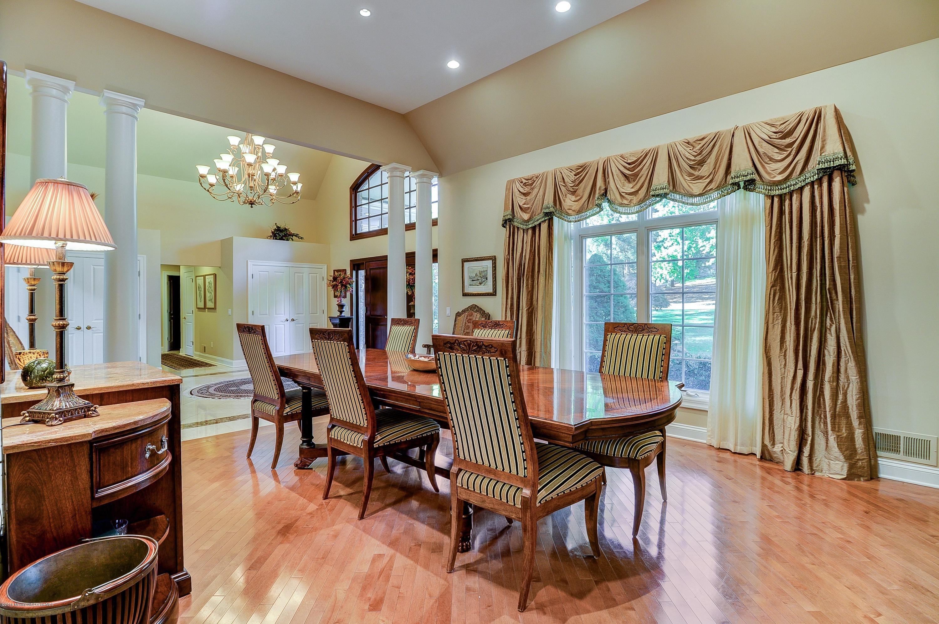 31 Beaver Dam Road Colts Neck, NJ 07722 - Photo 12 of 54 a view of a dining room with furniture and wooden floor