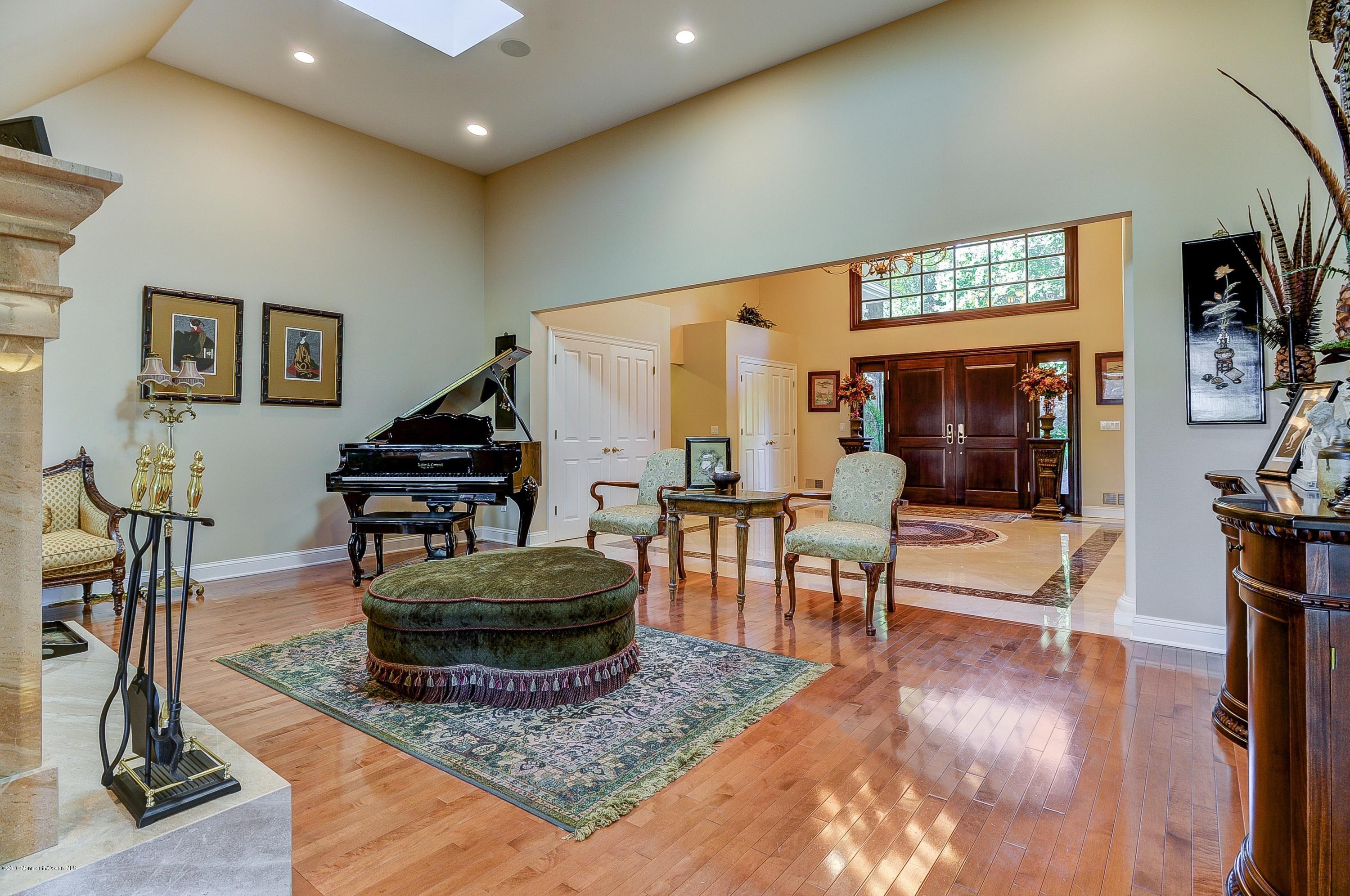 31 Beaver Dam Road Colts Neck, NJ 07722 - Photo 14 of 54 a living room with furniture and a piano