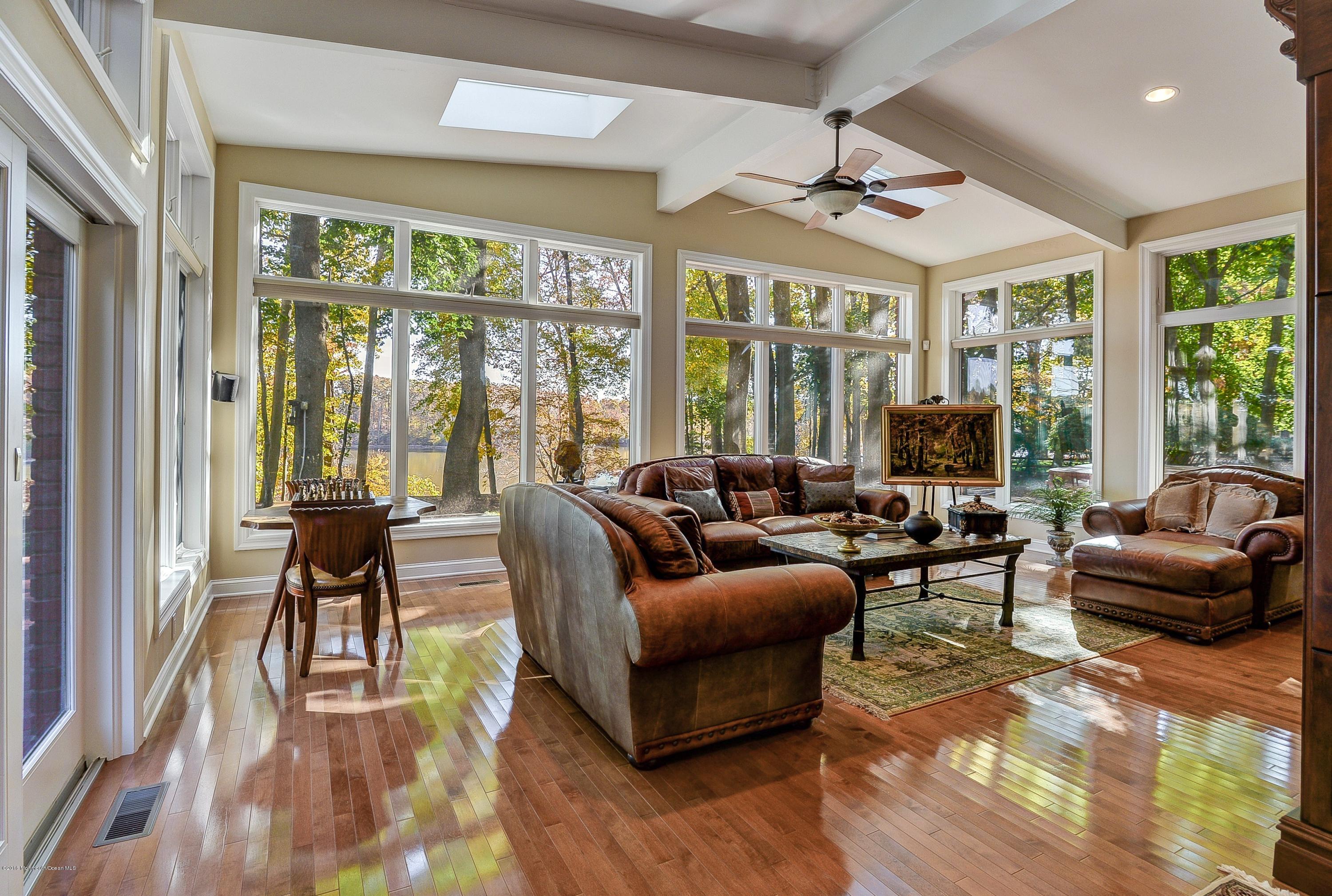31 Beaver Dam Road Colts Neck, NJ 07722 - Photo 15 of 54 a living room with furniture and a large window