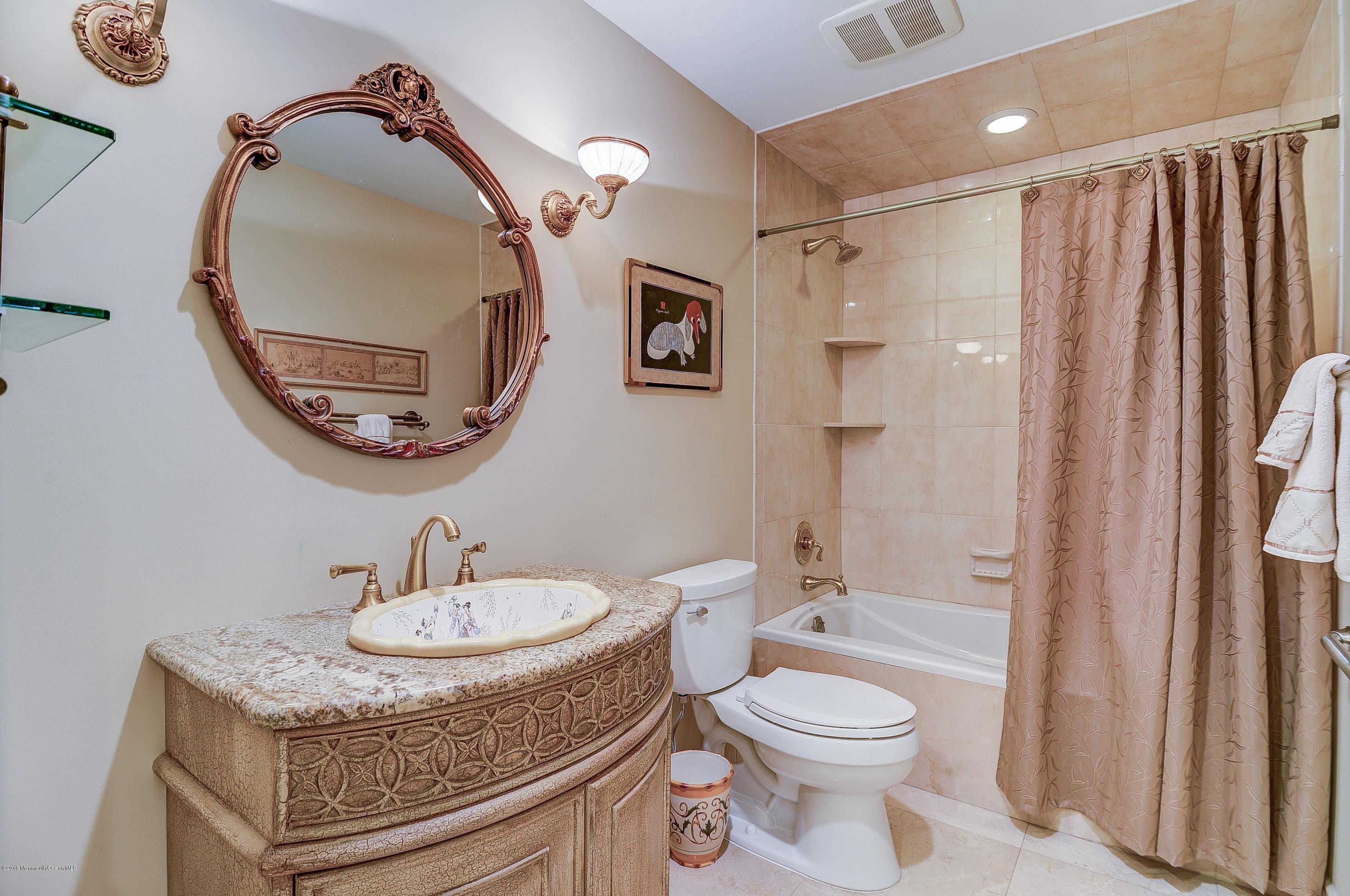 31 Beaver Dam Road Colts Neck, NJ 07722 - Photo 31 of 54 a bathroom with a sink toilet and shower