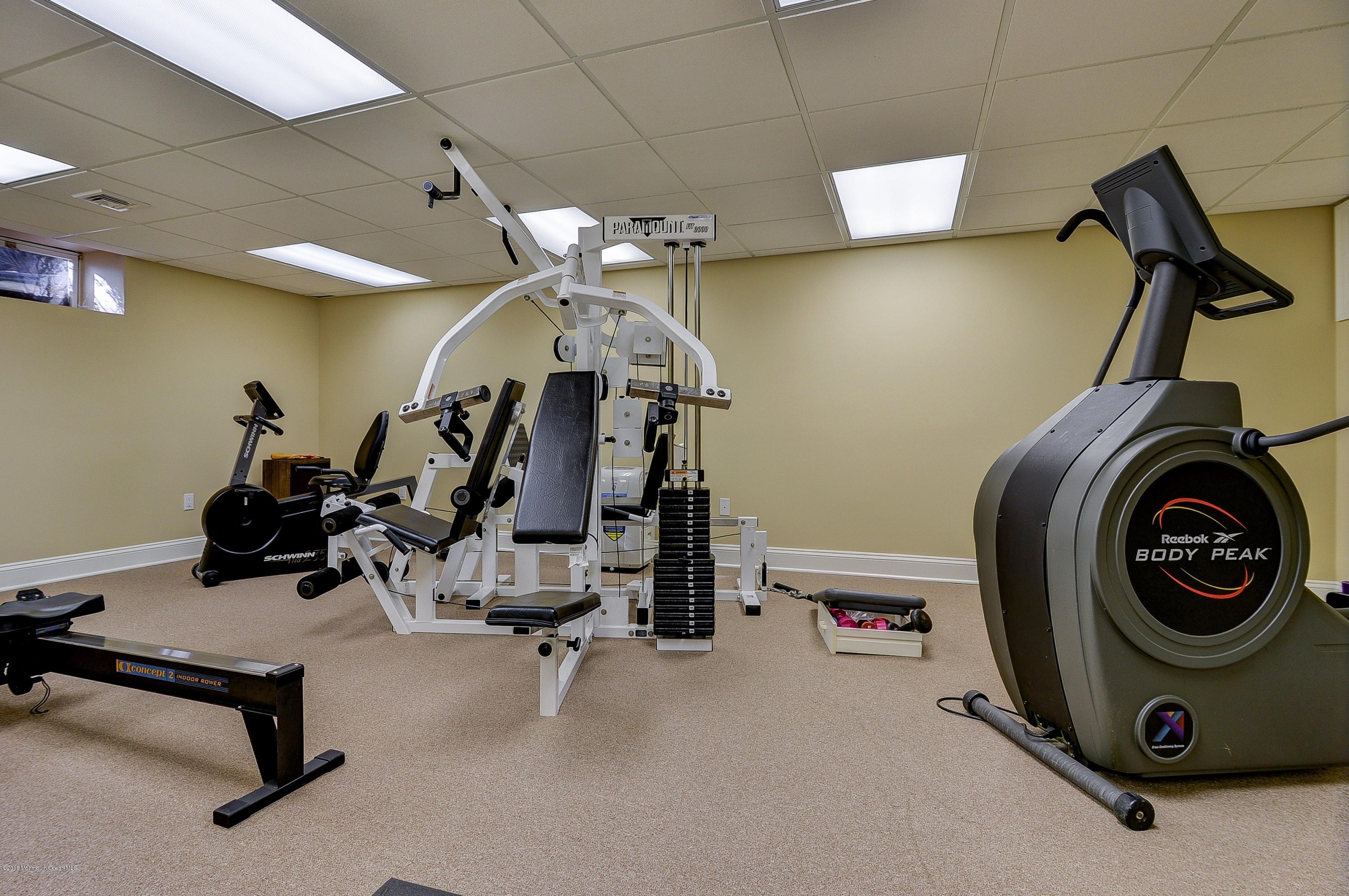31 Beaver Dam Road Colts Neck, NJ 07722 - Photo 35 of 54 a view of a room with gym equipment