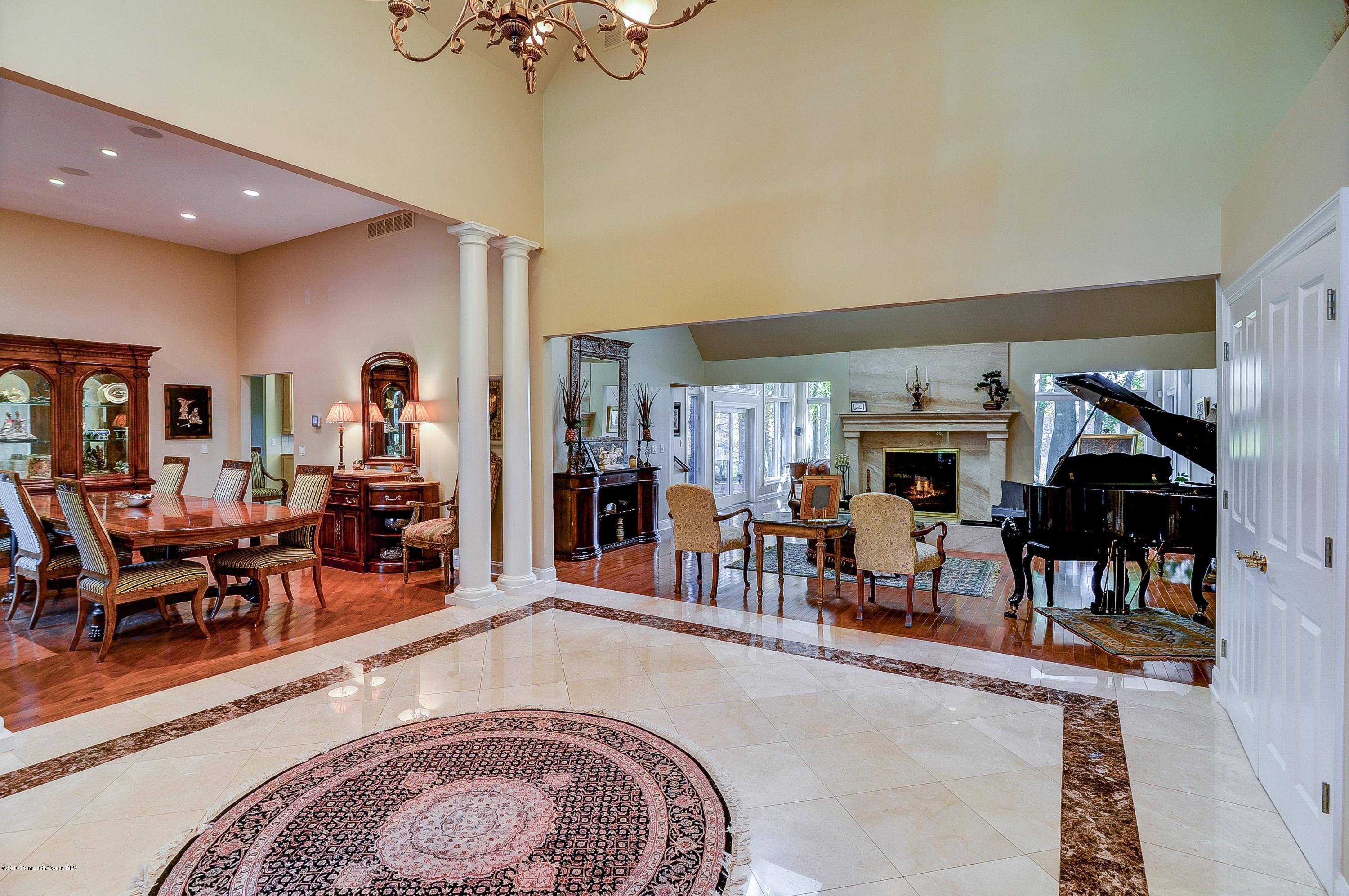 31 Beaver Dam Road Colts Neck, NJ 07722 - Photo 9 of 54 a living room with furniture a rug and a large window
