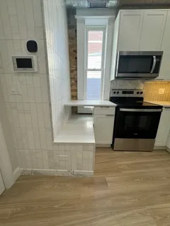 a view of kitchen and microwave