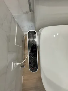 a bathroom with a mirror