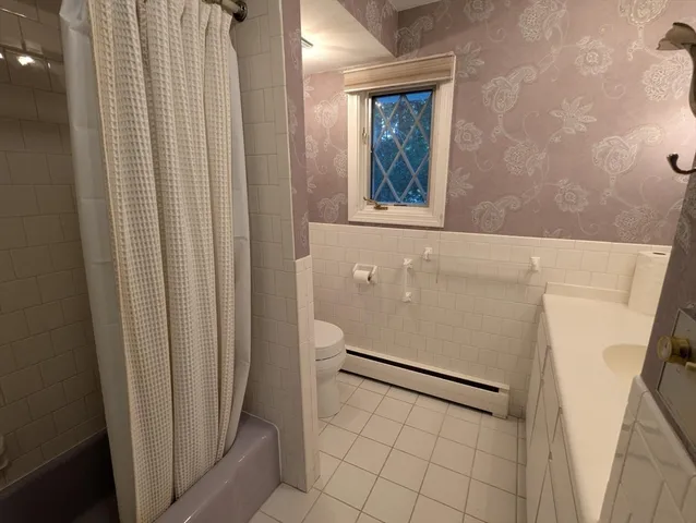 a white refrigerator freezer and a table