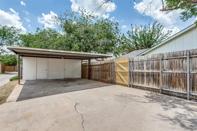 a view of backyard with green space