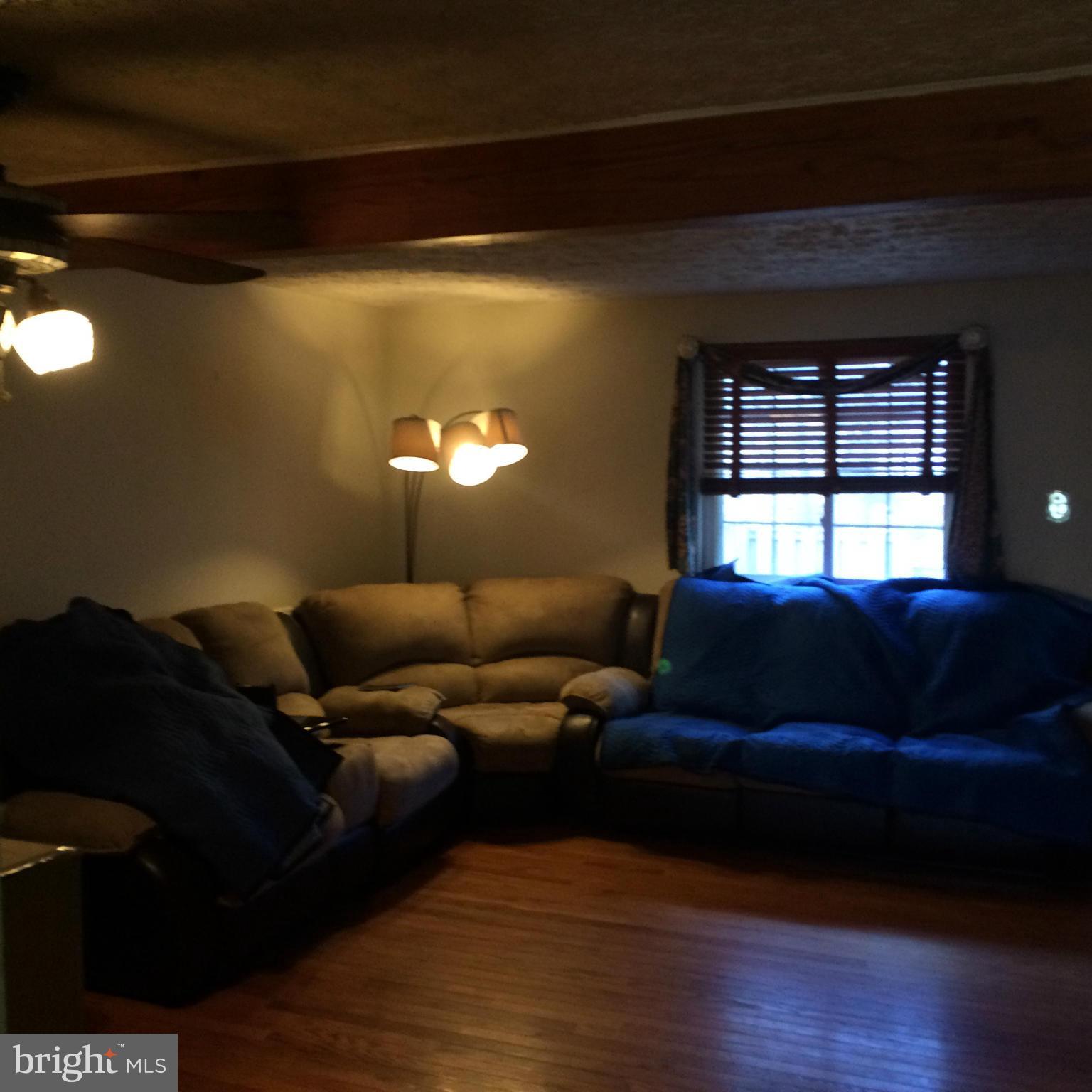 8094 Grandview Court Springfield, VA 22153 - Photo 4 of 13 a living room with furniture and a window