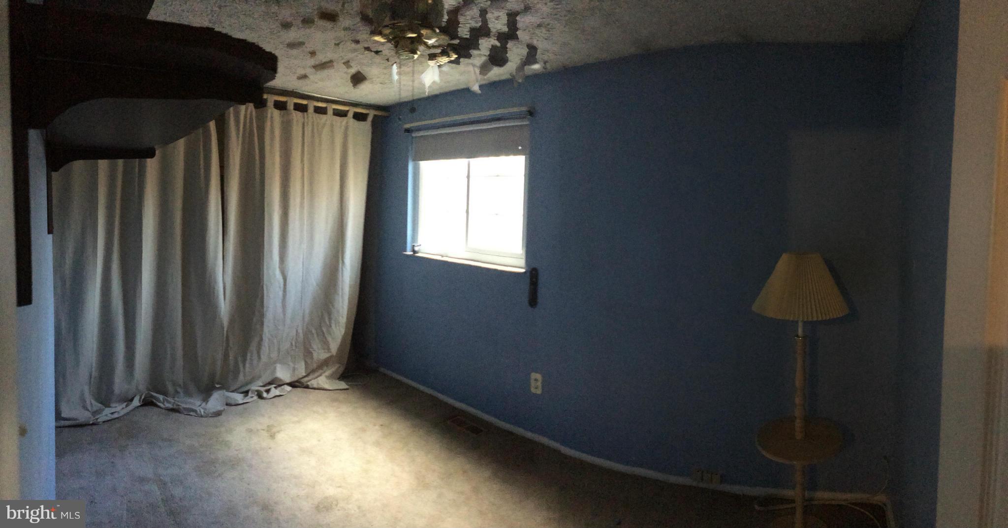 8094 Grandview Court Springfield, VA 22153 - Photo 7 of 13 an empty room with wooden floor and windows