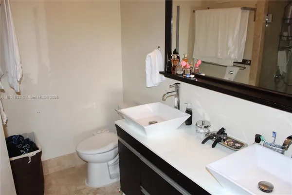 a bathroom with a sink and a toilet