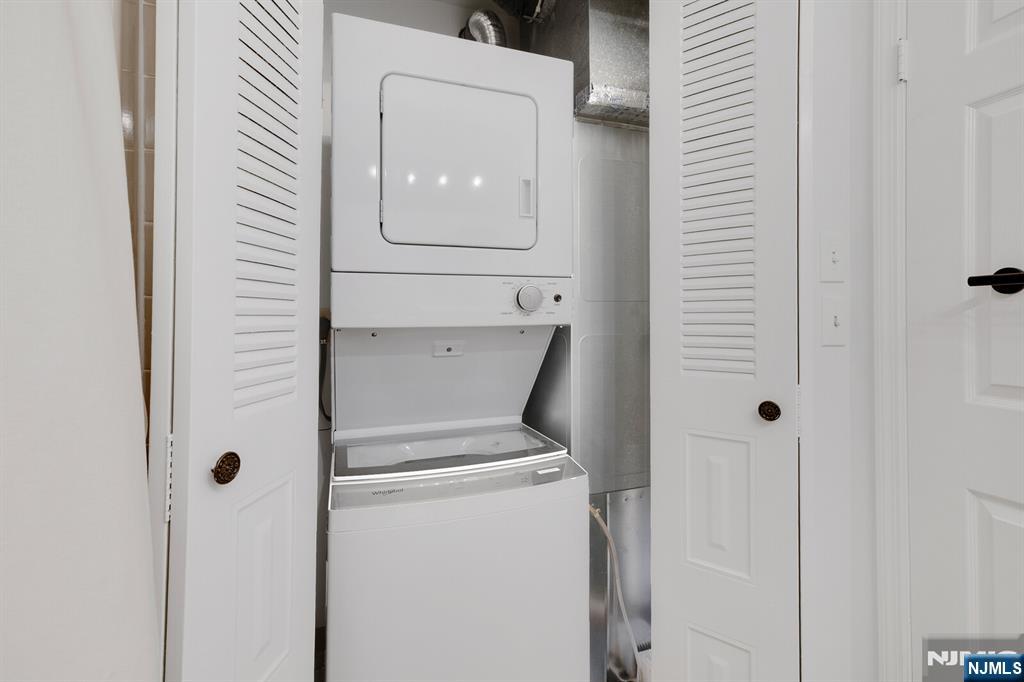 199 Union Avenue, Unit 2F Rutherford, NJ 07070 - Photo 12 of 25 a utility room with dryer and washer