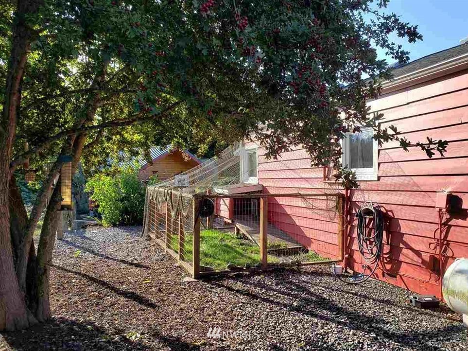 300 McComb Road Sequim, WA 98382 - Photo 22 of 25 a view of a house with a yard