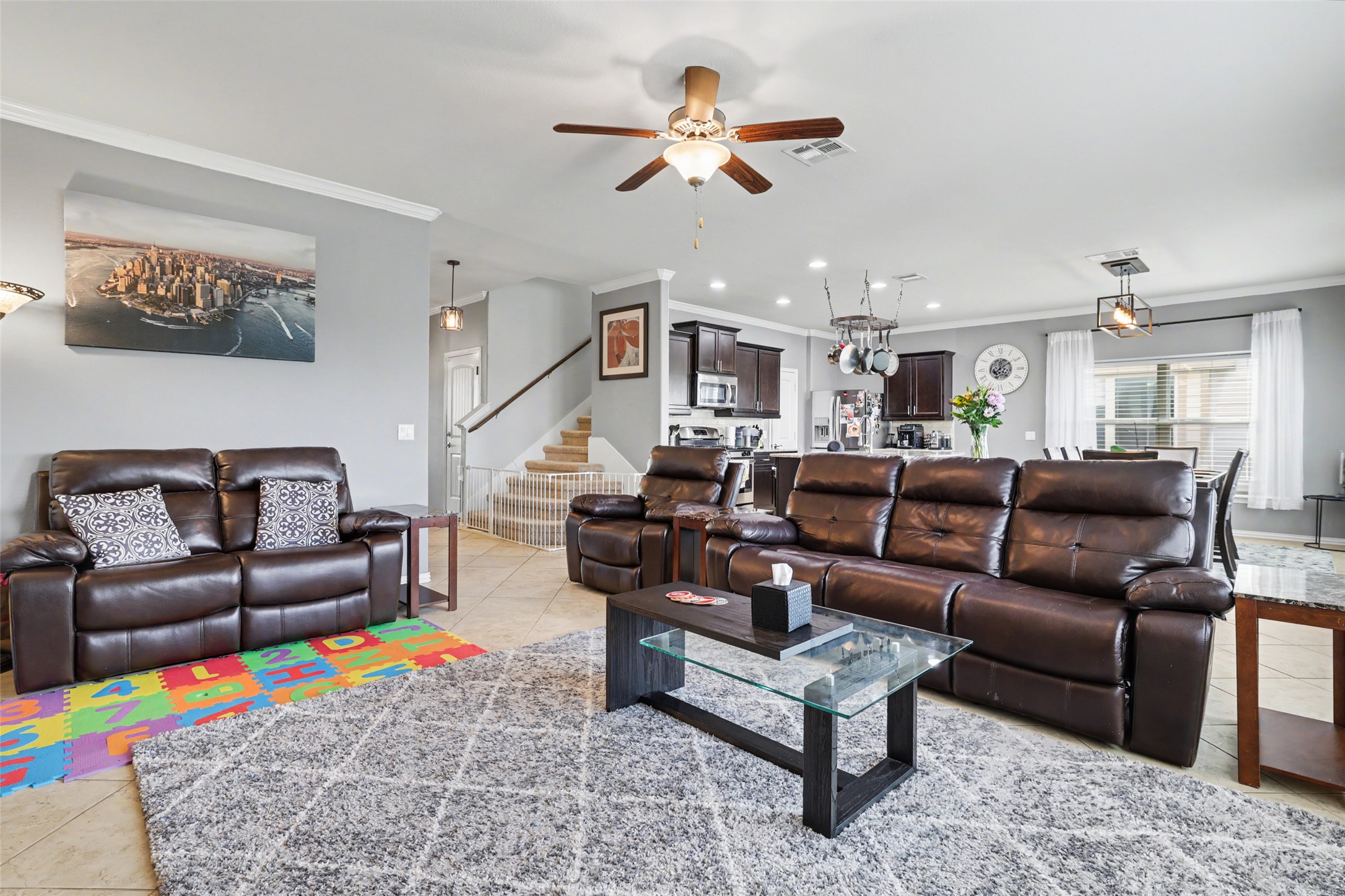 5845 Kleberg Trail Austin, TX 78747 - Photo 11 of 30 a living room with furniture wooden floor and a ceiling fan