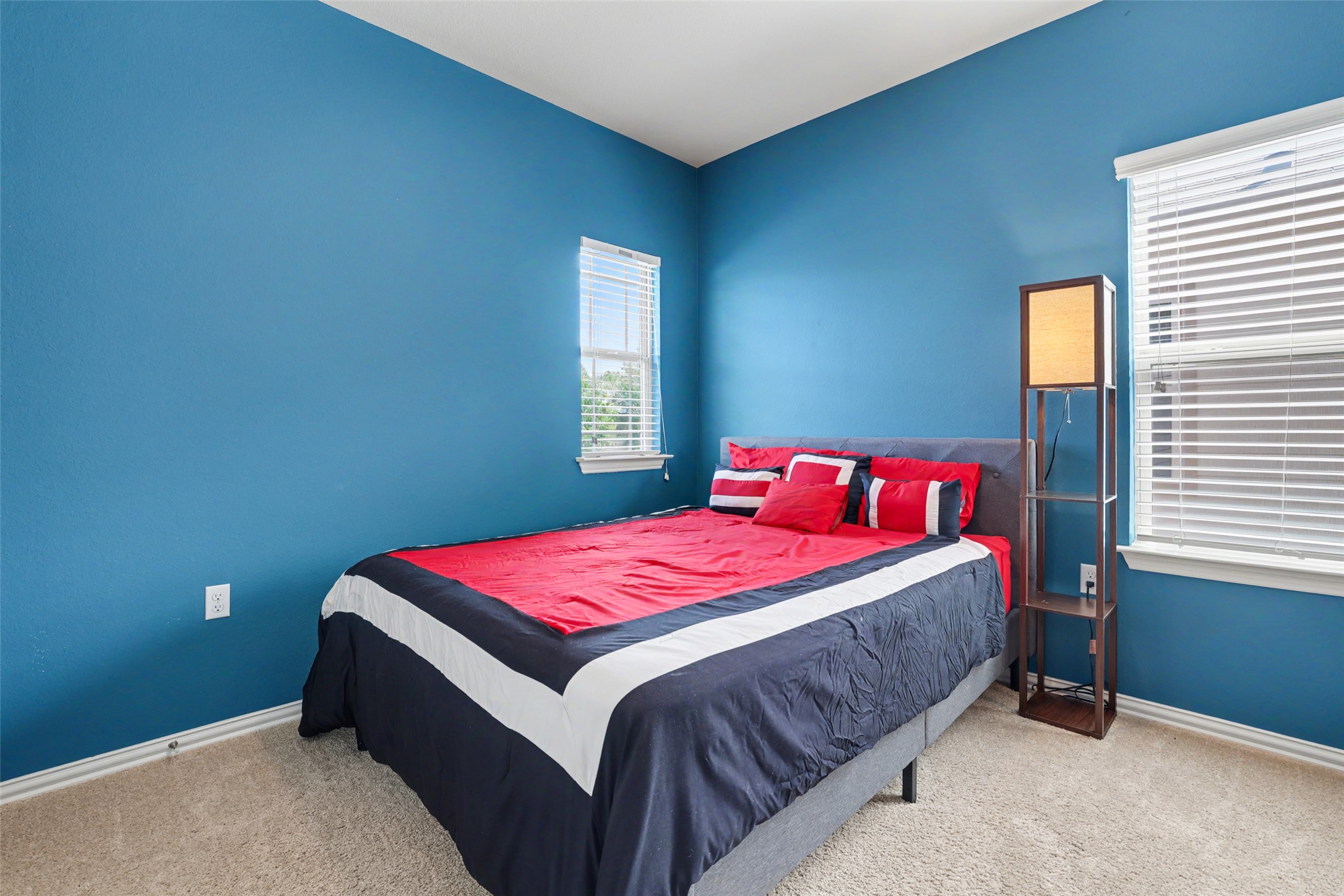 5845 Kleberg Trail Austin, TX 78747 - Photo 18 of 30 a bedroom with a bed and a window