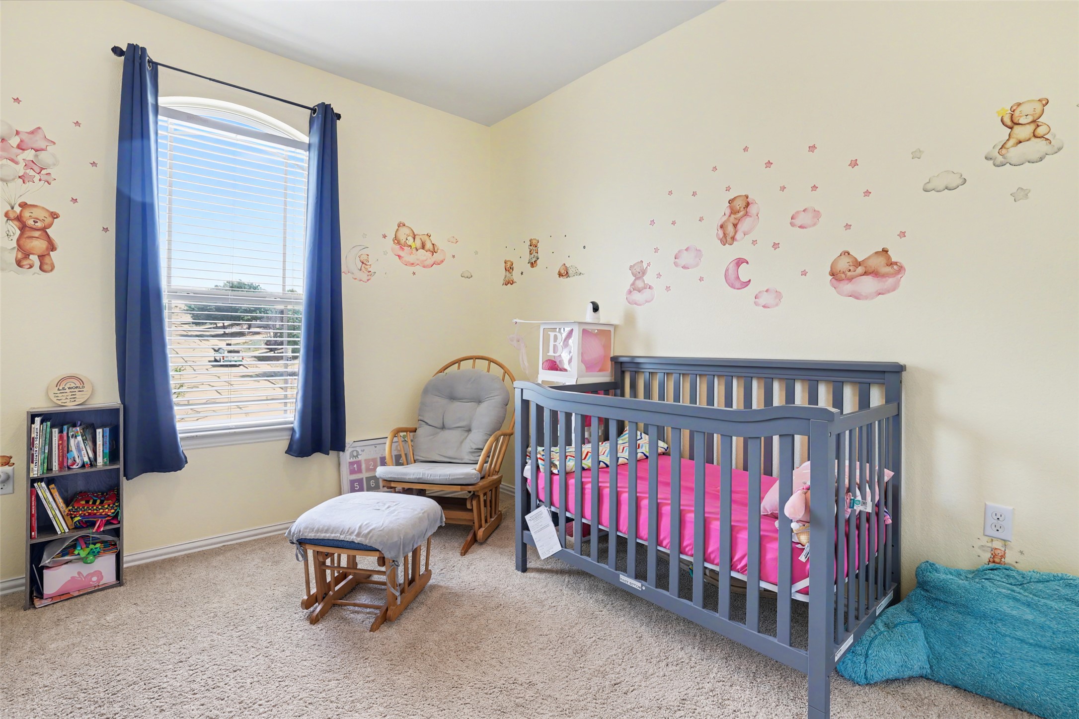 5845 Kleberg Trail Austin, TX 78747 - Photo 19 of 30 a bedroom with furniture and a window
