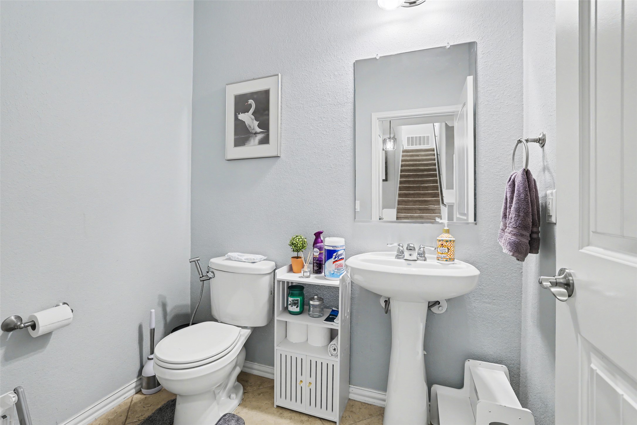 5845 Kleberg Trail Austin, TX 78747 - Photo 21 of 30 a bathroom with a sink mirror and toilet