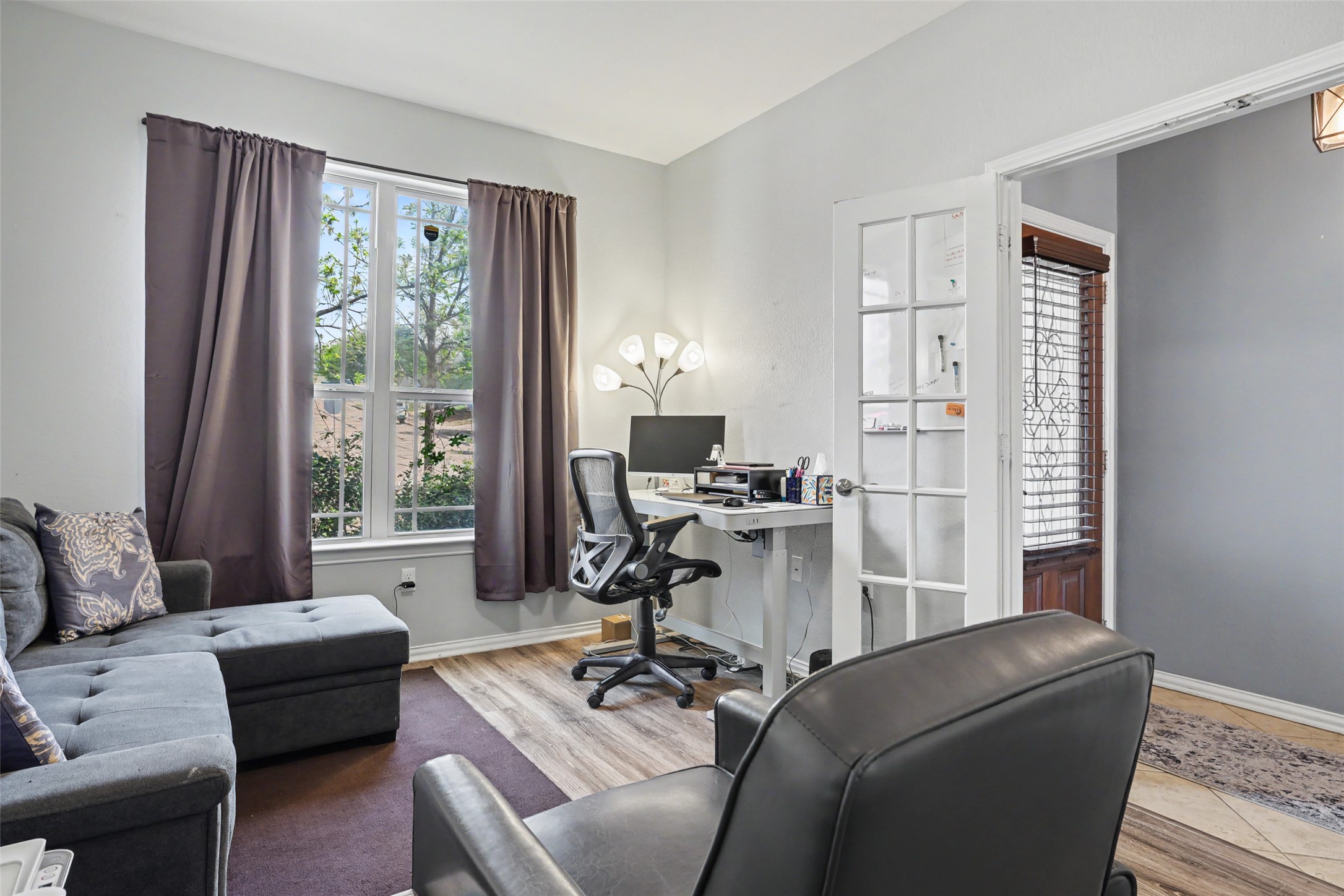 5845 Kleberg Trail Austin, TX 78747 - Photo 23 of 30 a living room with furniture and a window
