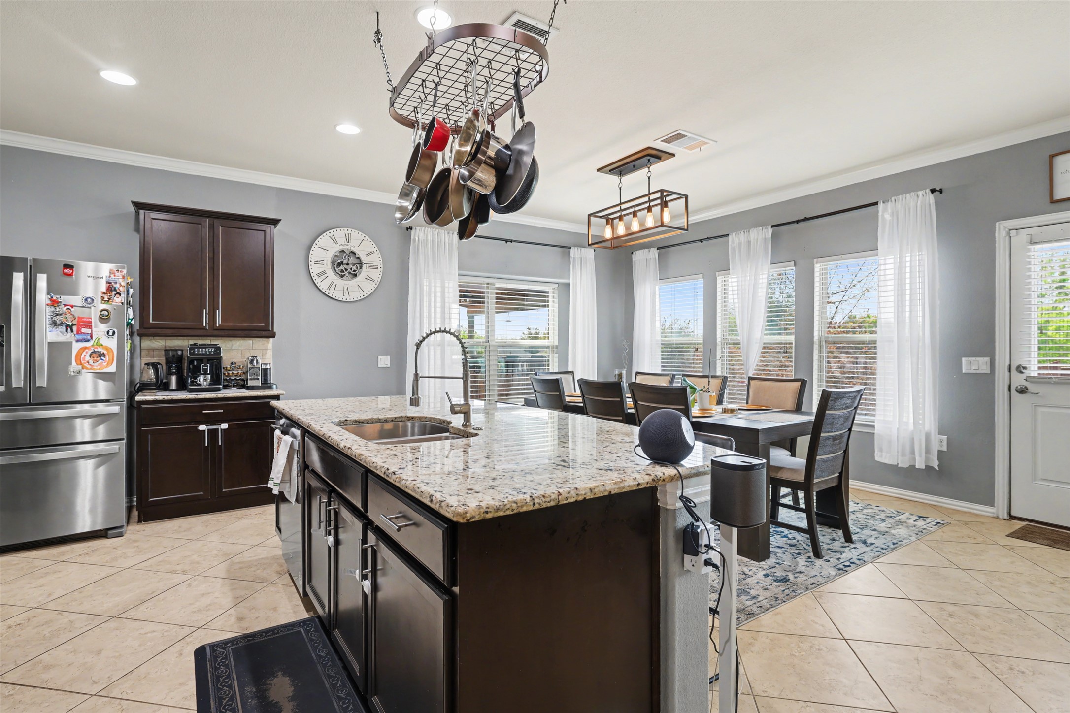 5845 Kleberg Trail Austin, TX 78747 - Photo 5 of 30 a kitchen with a table and chairs in it