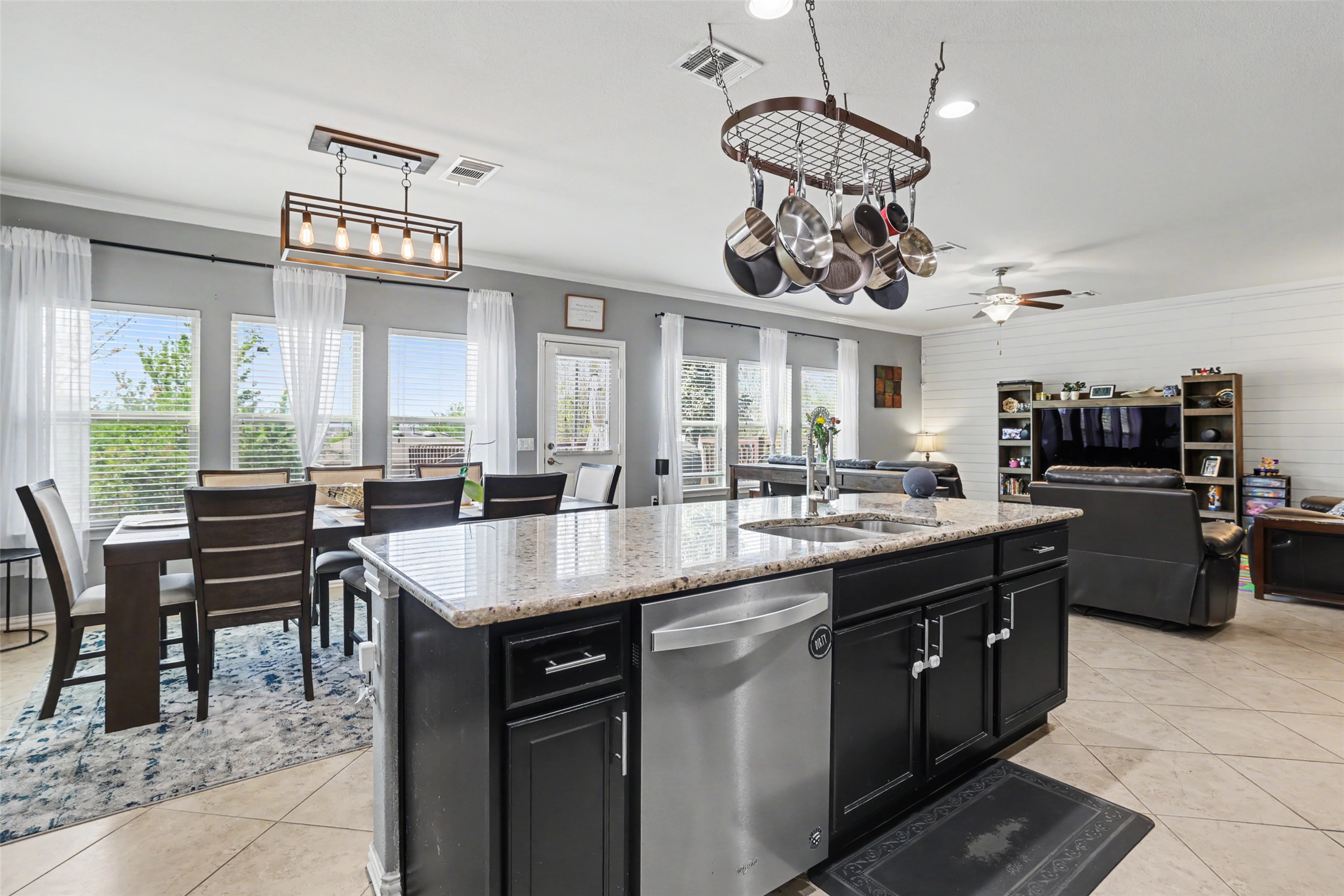5845 Kleberg Trail Austin, TX 78747 - Photo 6 of 30 a kitchen with a table and chairs in it
