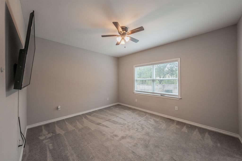 405 Dallas Street Rice, TX 75155 - Photo 14 of 40 a view of an empty room with a window
