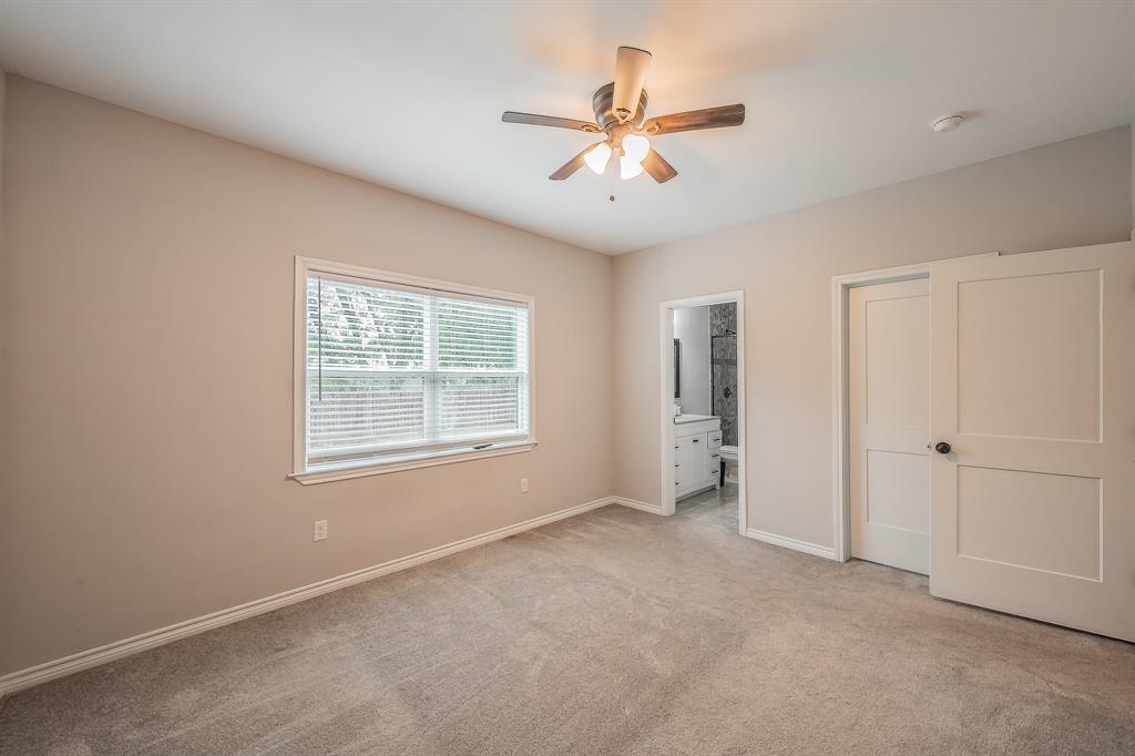 405 Dallas Street Rice, TX 75155 - Photo 16 of 40 a view of an empty room with a window