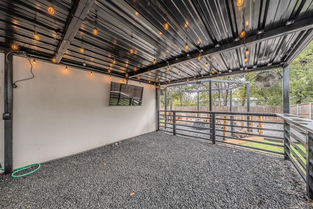 405 Dallas Street Rice, TX 75155 - Photo 32 of 40 a view of empty room with wooden walls