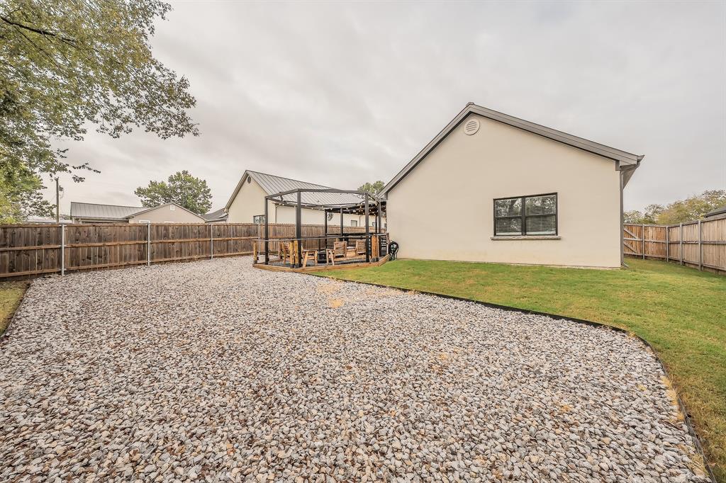 405 Dallas Street Rice, TX 75155 - Photo 39 of 40 a view of a backyard