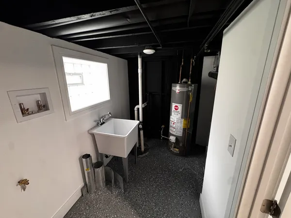 a view of a hallway with seating area