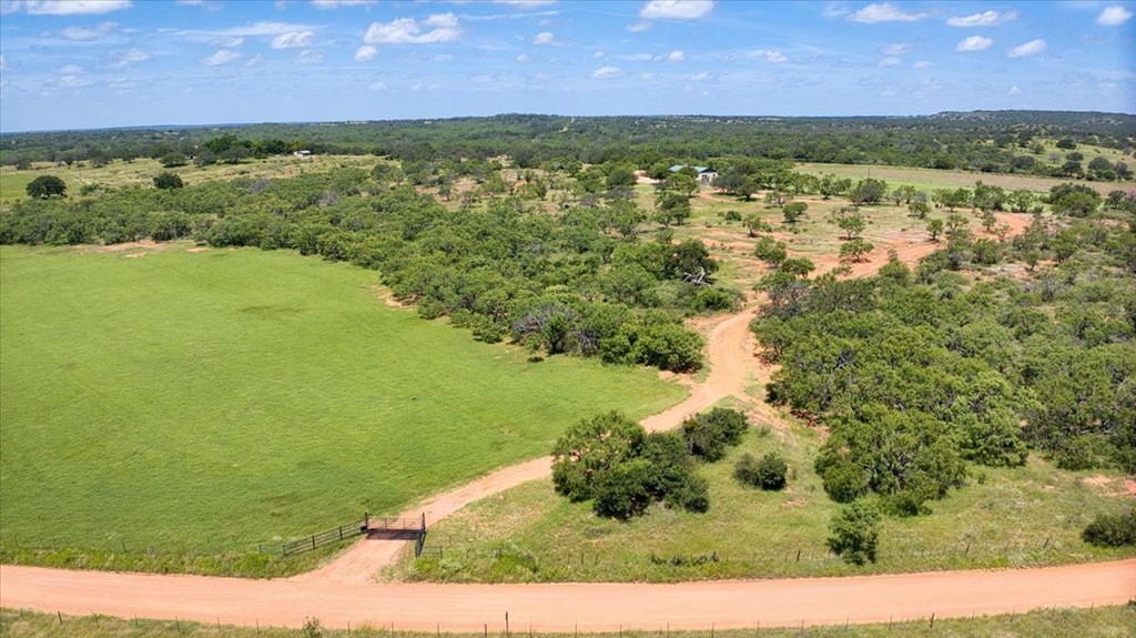 6446 Blackjack Road Fredonia, TX 76842 - Photo 6 of 48 a view of a yard with an outdoor space