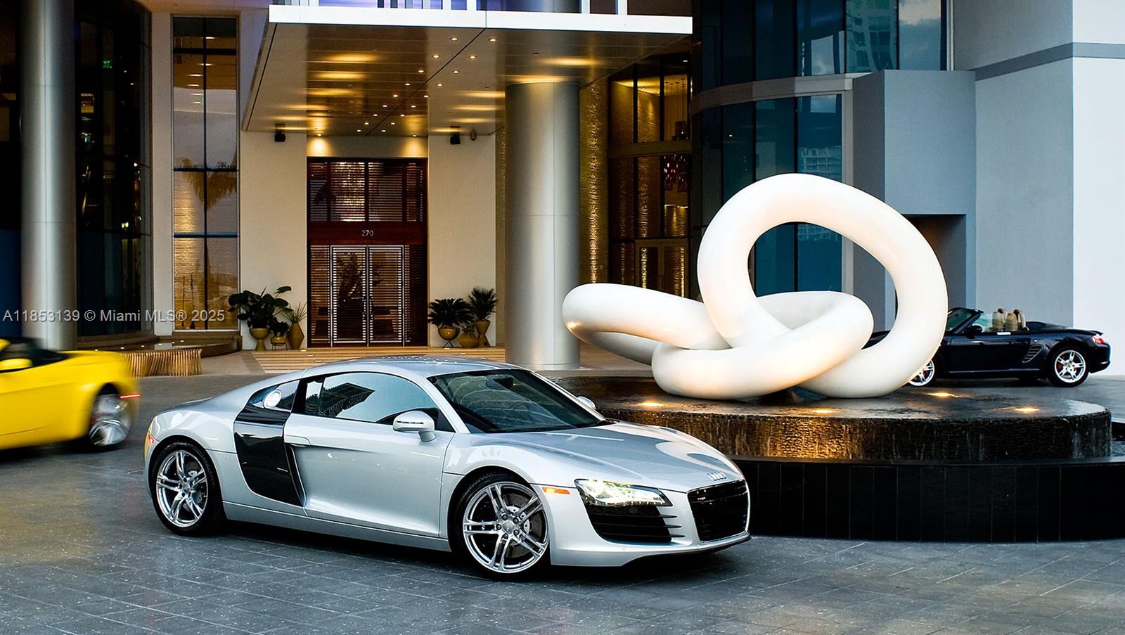 200 Biscayne Blvd Way, Unit 904 Miami, FL 33131 - Photo 21 of 24 a front view of a house with parking space