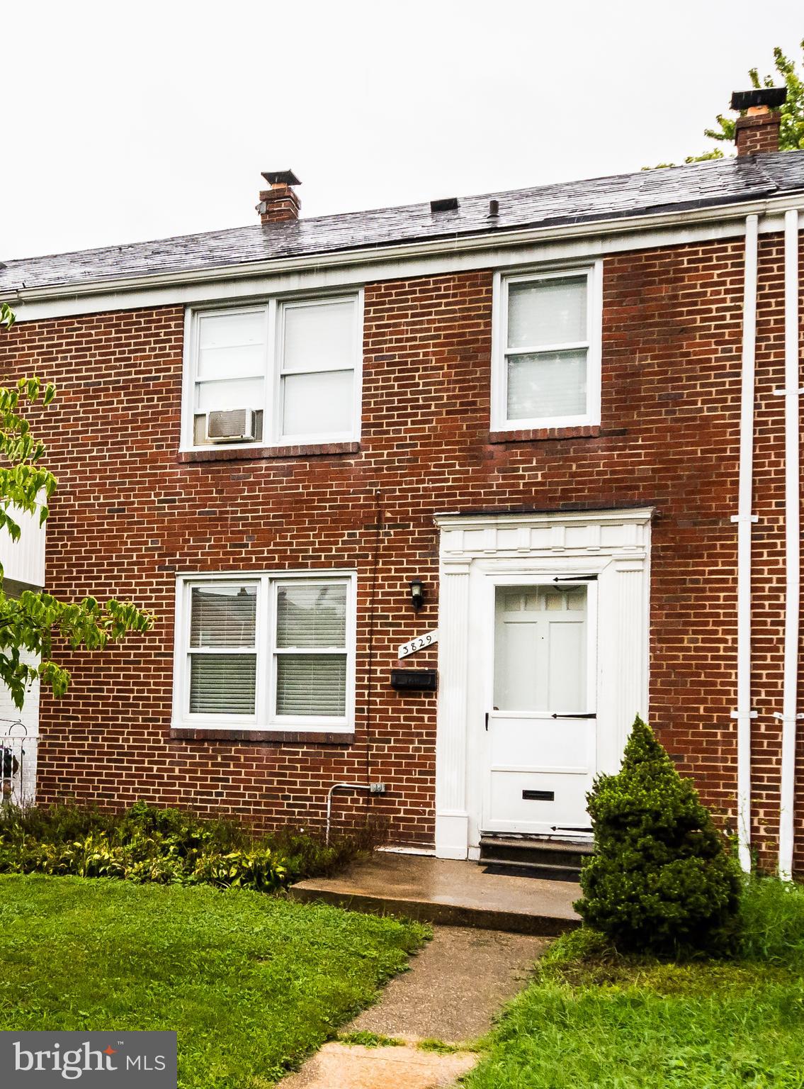 3829 Monterey Road Baltimore, MD 21218 - Photo 1 of 25 a view of a house with a yard