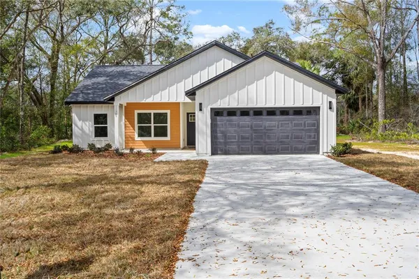 a front view of house with yard
